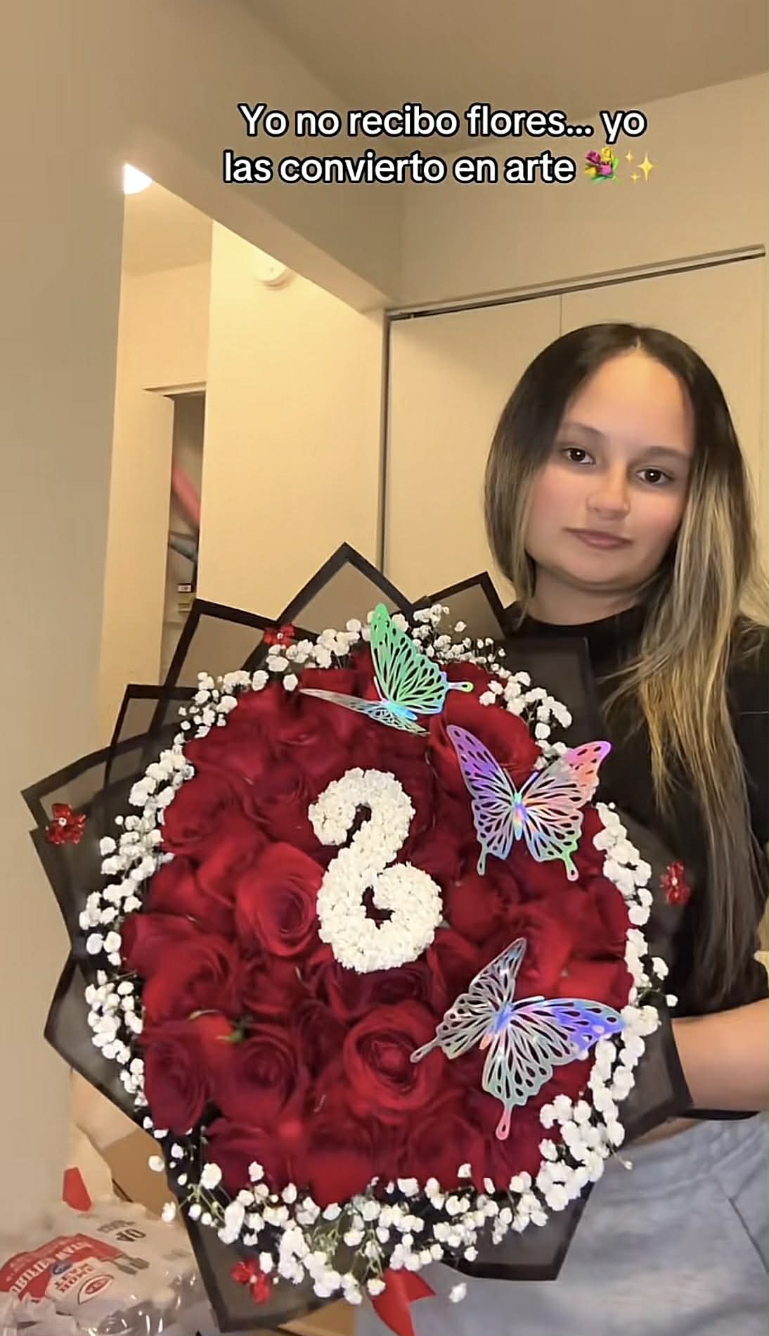 Red roses bouquet with butterflies